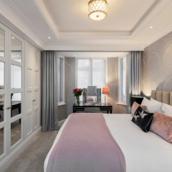 bedroom with fitted wardrobes, king size bed and dressing table, Hyde Park Apartments, Mayfair, London W1