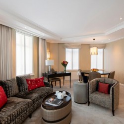 living room with large sofa, round table, chair, work desk and dining area, Hyde Park Apartments, Mayfair, London W1