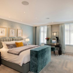 bedroom with super king bed, dresser and mirror, Hyde Park Apartments, Mayfair, London W1