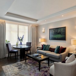 living room with dining table, sofa, chair, lamps and small table, Hyde Park Apartments, Mayfair, London W1