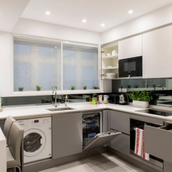 fully equipped kitchen with dishwasher and washer/dryer, Hyde Park Apartments, Mayfair, London W1