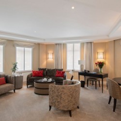 living area with chairs, sofa, working desk and dining area, Hyde Park Apartments, Mayfair, London W1