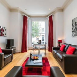 2 bedroom apartment with leather sofa, chair, dining table in Longridge Apartments, Kensington, London SW5