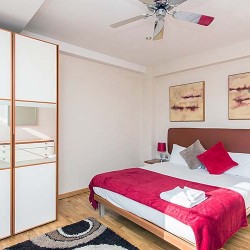 bedroom with fitted wardrobe and double bed, Old Brompton Apartments, Kensington, London SW5