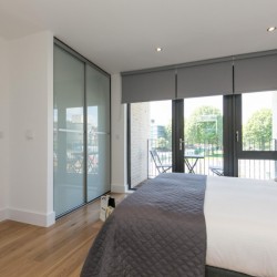 bedroom with fitted wardrobes, balcony, Portobello Road Apartments, Notting Hill, London W10