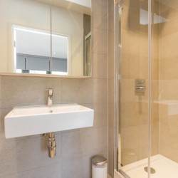 bathroom with sink, mirror and shower, Portobello Road Apartments, Notting Hill, London W10