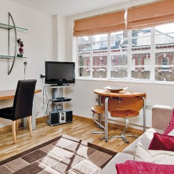 studio room with sofa, dining table, work desk and TV, Old Brompton Apartments, Kensington, London SW5