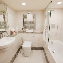 bathroom with bath tub and shower, Belsize Apartments, Maida Vale, London NW6