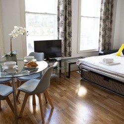 dining table and sofa bed in Kings Apartments, Covent Garden, London