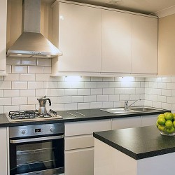 kitchen with cooking hob, sink and work top, Hammersmith Apartments, Hammersmith, London W6