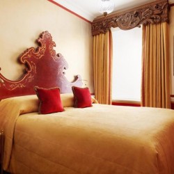 yellow double bedroom, The Milestone Residences, Kensington, London W8