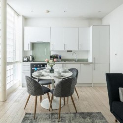 kitchen with dining table and chairs, Goodge Street Apartments, Fitzrovia, London W1