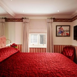 red and white double bedroom, The Milestone Residences, Kensington, London W8