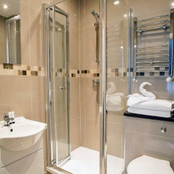 shower room with towel rail and sink, ,Hammersmith Apartments, Hammersmith, London W6 london w6
