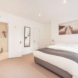 large double bedroom with en suite bathroom, Greek Street Apartments, Soho, London