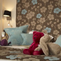 bed with cuddly toys, Beaufort Apartments, Knightsbridge, London SW3