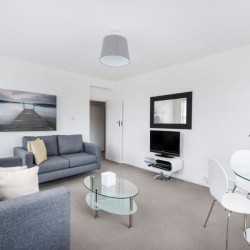 bright living room with 2 sofa, coffee table, tv and dining area, Pimlico Corporate Apartments, Pimlico, London SW1
