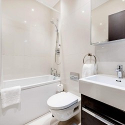 bathroom with shower over bathtub, kensington, london