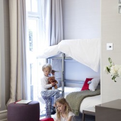 children in bedroom with bunk beds, Piccadilly Apartments, Mayfair, London