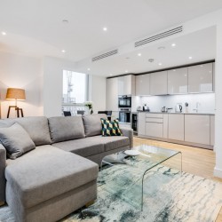 open plan living room with kitchen, wood floor, Riverside Apartments, Vauxhall, London