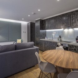living area with kitchen and dining table, Bourchier Apartments, Soho, London