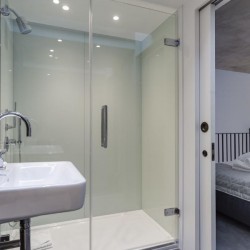 shower room and part of bedroom, Bourchier Apartments, Soho, London