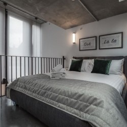 double bedroom in mezzanine apartment, Bourchier Apartments, Soho, London