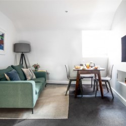 2 bedroom apartment, living area with dining table, Hyde Park Apart Hotel, Paddington, London