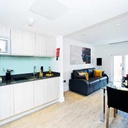 living area with kitchen, dining table and sofa, Deptford Apart Hotel, Deptford, London