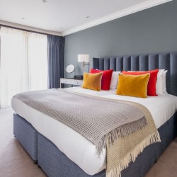 double bedroom, living room with dining table and balcony, Lees Serviced Apartments, Mayfair, London W1
