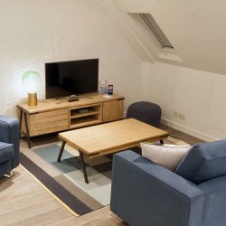 living room with smart tv and table, Rathbone Apartments, Fitzrovia, London W1