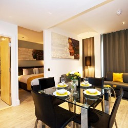 dining table, sofa and view to bedroom, Greenwich Apart Hotel, Greenwich, London