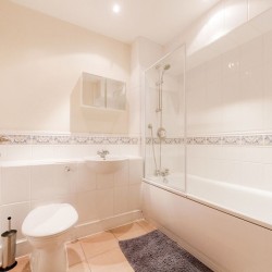 bathroom with tub and shower, Cascades Apartments, Wimbledon, London SW19