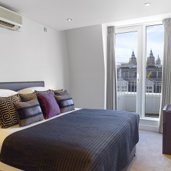 bedroom with king size bed and balcony,South Kensington Luxury, Kensington, London SW7