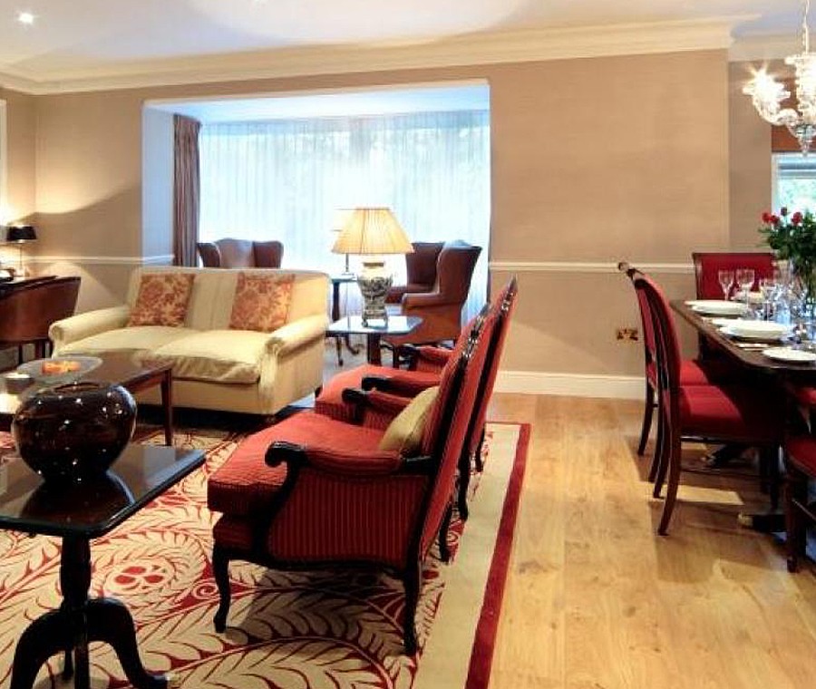 red chairs, sofa, part of dining area, Knightsbridge Apartments, Knightsbridge, London SW3