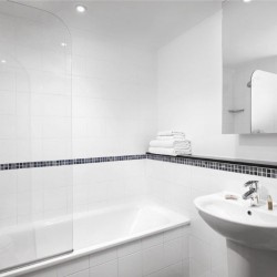 bathroom with bath tub, shower and sink, Limehouse Apartments, Limehouse, London E1