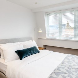 double bed and side lamps, Fulham Apartments, Fulham, London SW6