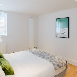 double bed, lamp and long mirror, Fulham Apartments, Fulham, London SW6