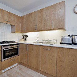 kitchen with kettle, toaster, and utensils, Oxford Street Apartments, Marylebone, London W1
