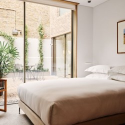 bedroom and part of courtyard, Weymouth Apartment, Marylebone, London