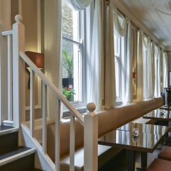 breakfast room with steps to outside terrace, Queen's Apart Hotel, Kensington, London SW7