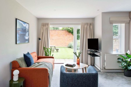 living room with sofa, table, TV and view to the garden, Castle Apartments, Reading, Berkshire RG1
