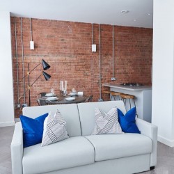 Living room and dining area in Shoreditch Apartments, London