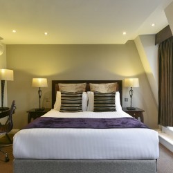 bedroom with double bed and work desk, Queen's Apart Hotel, Kensington, London SW7