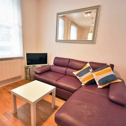 large sofa, Wardour Serviced Apartments, Soho, London W1