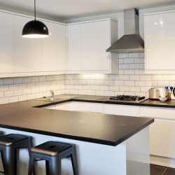 kitchen with worktop, stools and appliances, Hammersmith Apartments, Hammersmith, London W6