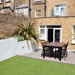 large outside garden with dining table, sHammersmith Apartments, Hammersmith, London W6mersmith Apartments, Hammersmith, London W6