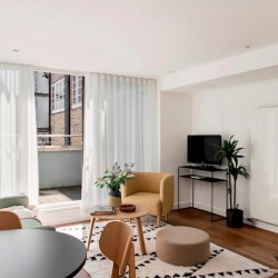 living room with balcony and dining area, Martins Apartments, Covent Garden, London WC2