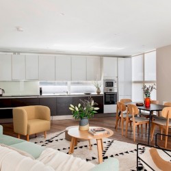 living area with dining table and kitchen, Martins Apartments, Covent Garden, London WC2