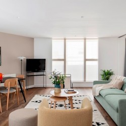 living room with sofa bed and dining area, Martins Apartments, Covent Garden, London WC2